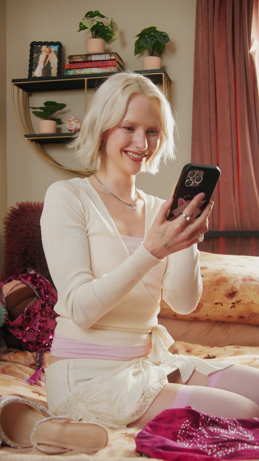 A woman in a warm, colorful interior in the Vinted film